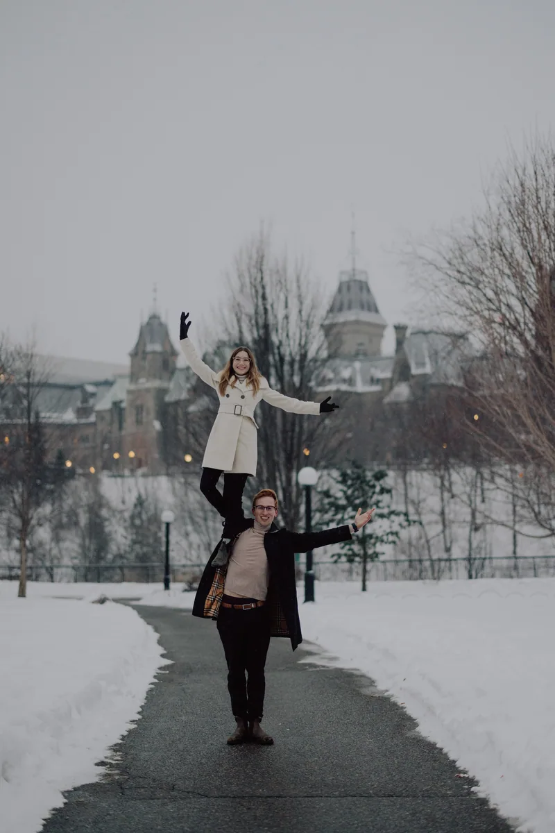 Kaitlyn and Alex during their engagement shoot on the frozen canal