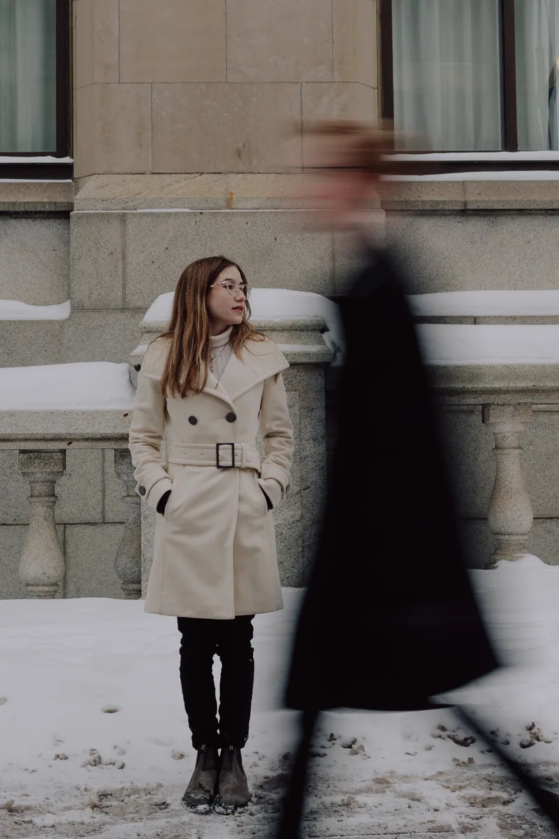 Kaitlyn and Alex during their engagement shoot on the frozen canal
