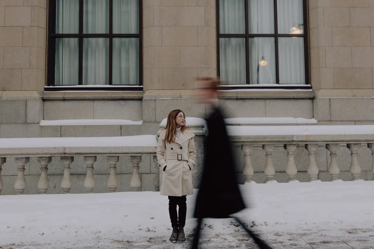 Kaitlyn and Alex during their engagement shoot on the frozen canal