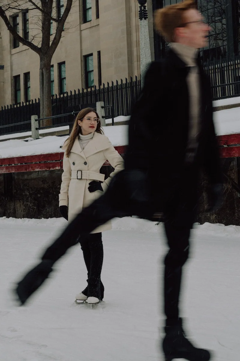 Kaitlyn and Alex during their engagement shoot on the frozen canal