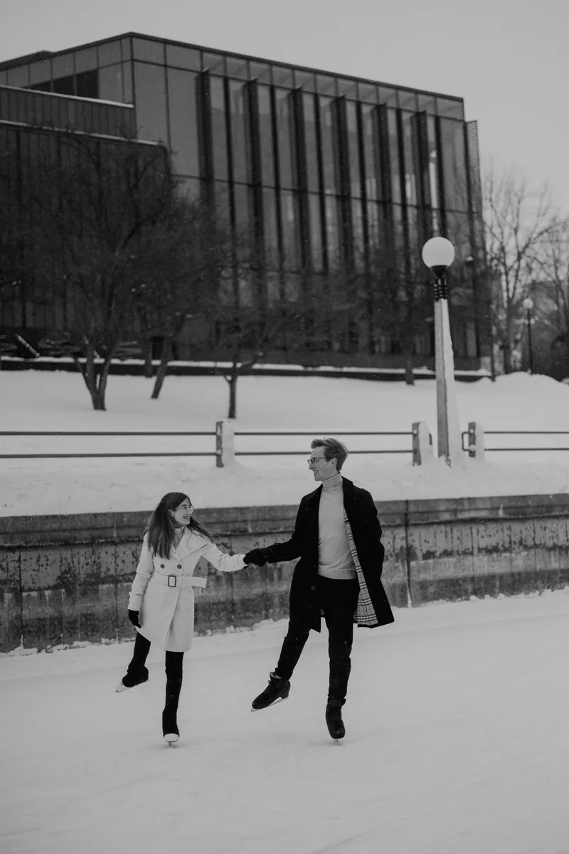 Kaitlyn and Alex during their engagement shoot on the frozen canal