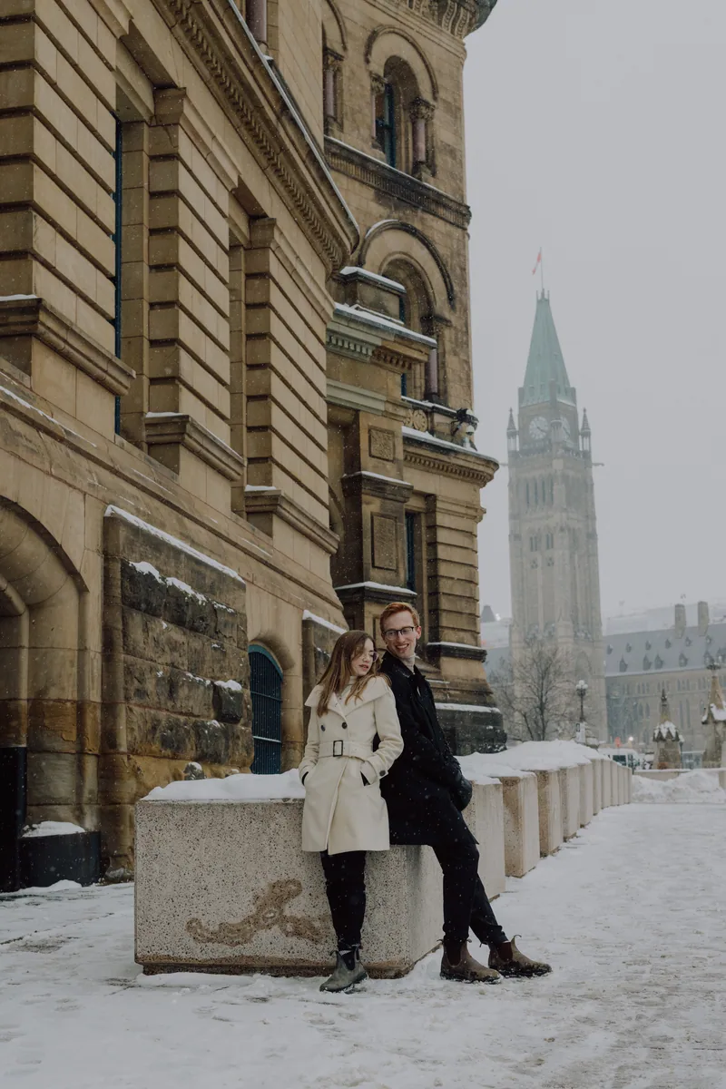 Kaitlyn and Alex during their engagement shoot on the frozen canal